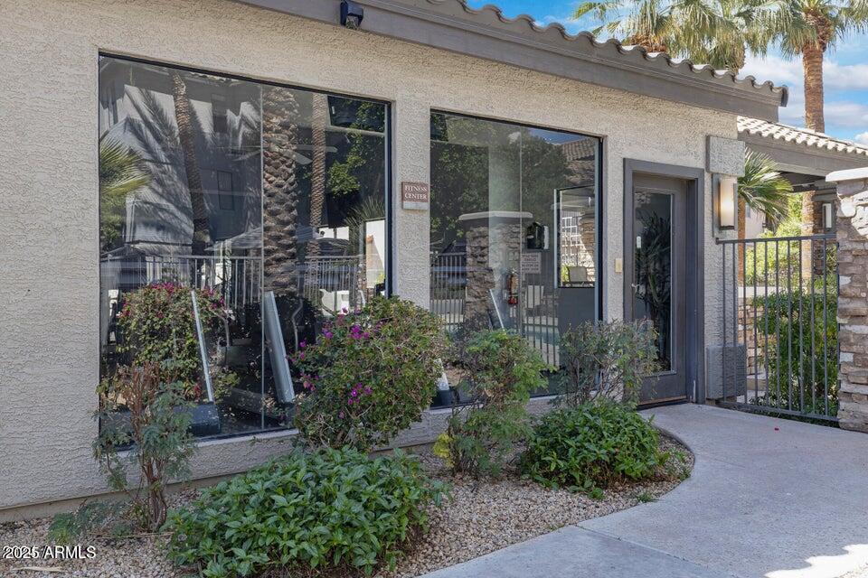 2025 East Campbell Avenue, Unit 140 Phoenix, AZ 85016 - Photo 39 of 52 front view of a house with a garden