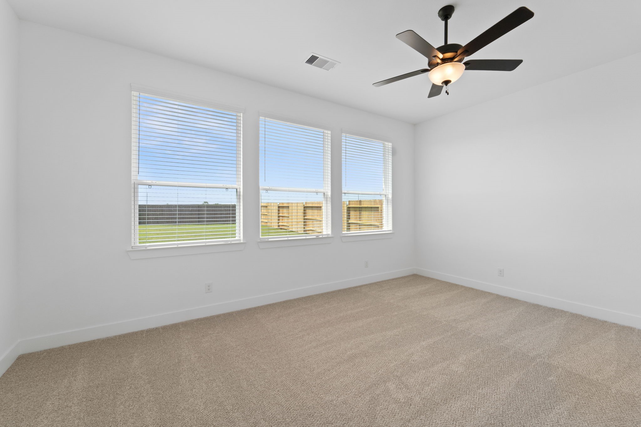 207 Blue River Trail Rosenberg, TX 77471 - Photo 20 of 38 an empty room with a window