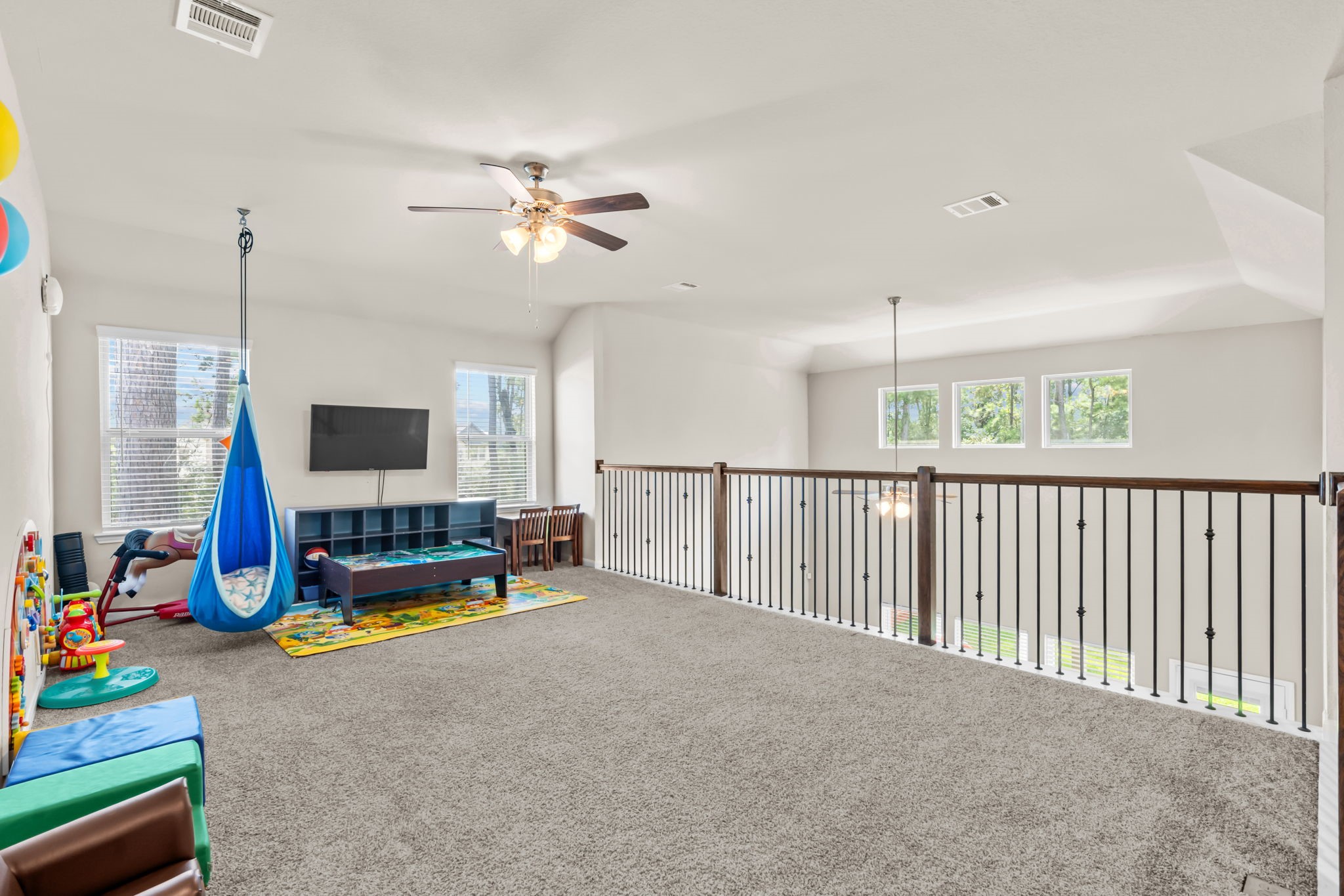 14388 Zion Gate Crossing Conroe, TX 77384 - Photo 22 of 34 a view of a room with gym equipment