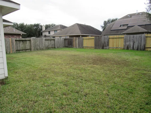 a view of a house with a garden
