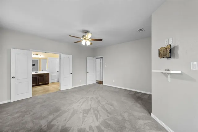a view of a livingroom with a bathroom