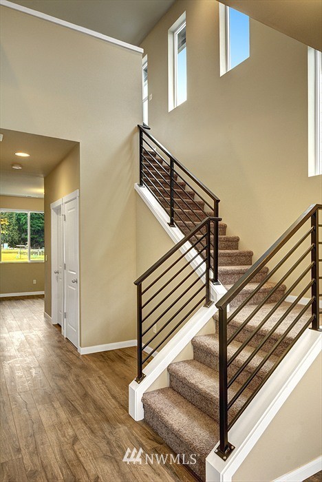 4325 Lot Place Southeast, Unit 14 223 Bothell, WA 98021 - Photo 4 of 14 a view of entryway and hall with wooden floor