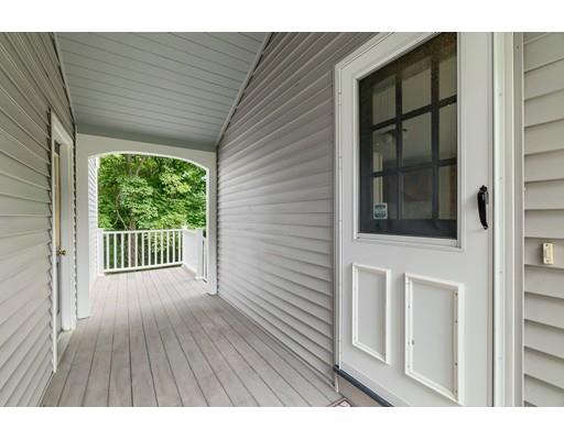 34 Brox Road Dracut, MA 01826 - Photo 25 of 35 a view of backyard with a deck