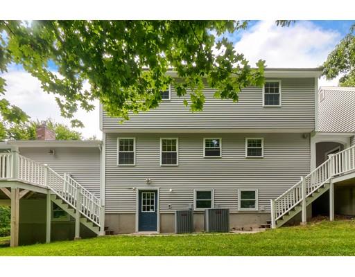 34 Brox Road Dracut, MA 01826 - Photo 27 of 35 a front view of a house with a yard