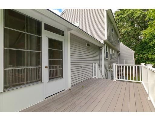 34 Brox Road Dracut, MA 01826 - Photo 30 of 35 a view of backyard with deck and wooden floor