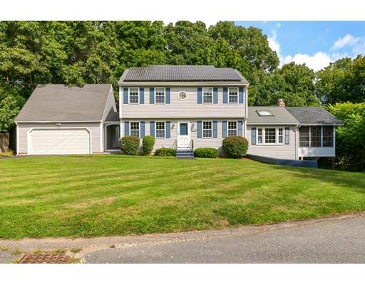 34 Brox Road Dracut, MA 01826 - Photo 35 of 35 a front view of a house with a garden