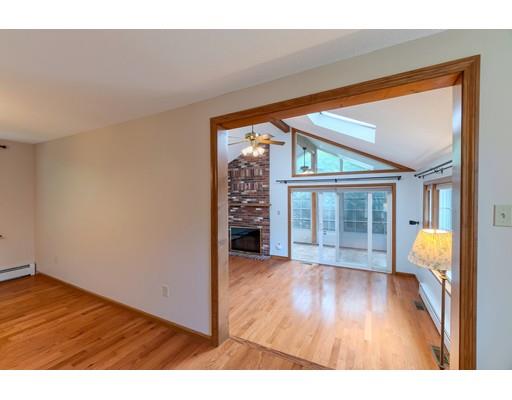 34 Brox Road Dracut, MA 01826 - Photo 8 of 35 a view of a room with wooden floor and a window