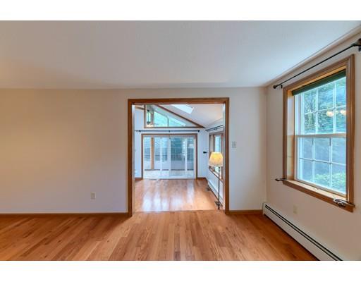 34 Brox Road Dracut, MA 01826 - Photo 9 of 35 a view interior of a house with wooden floor and windows