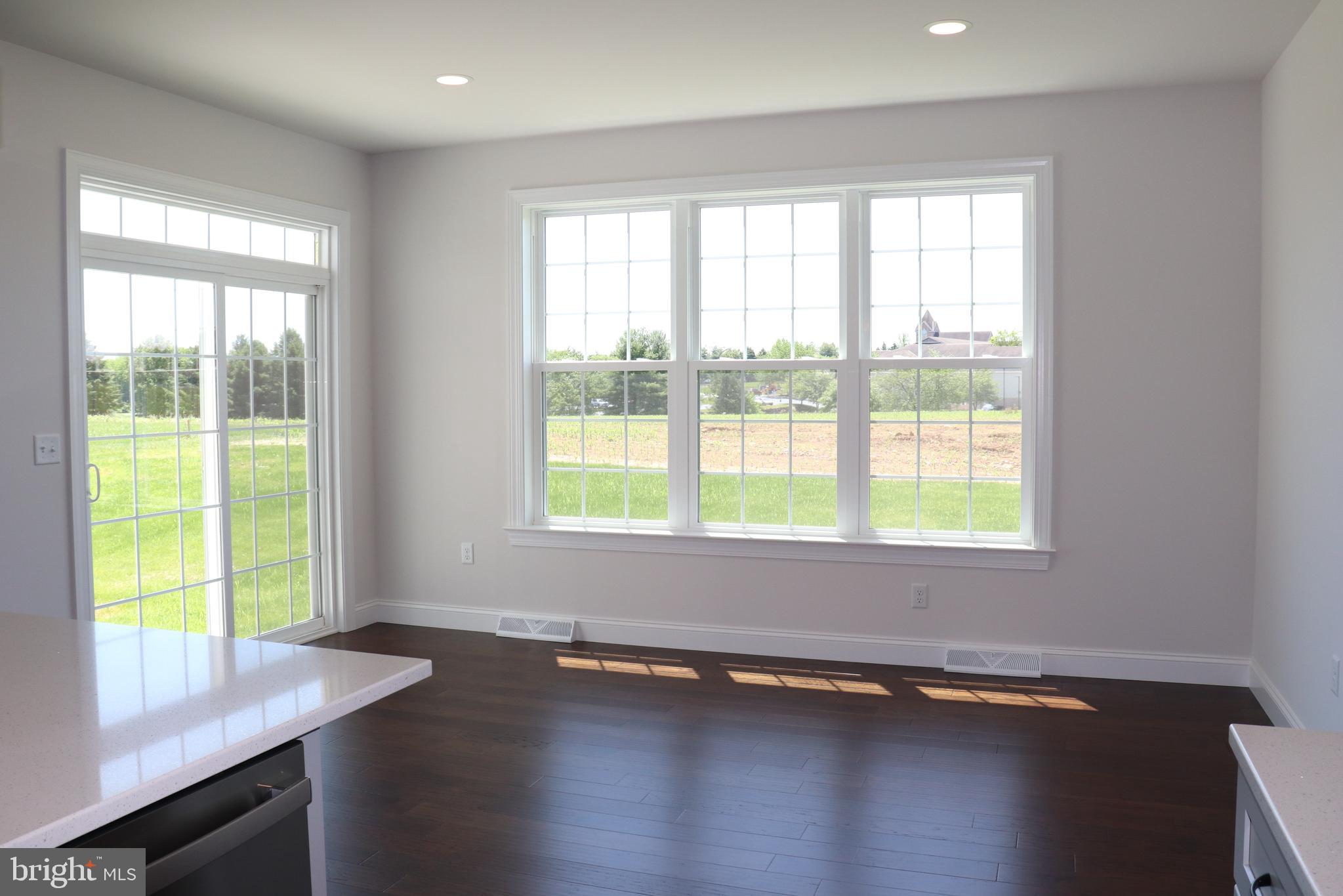 1029 Strafford Place, Unit 55 Lancaster, PA 17601 - Photo 14 of 40 a workspace with wooden floor