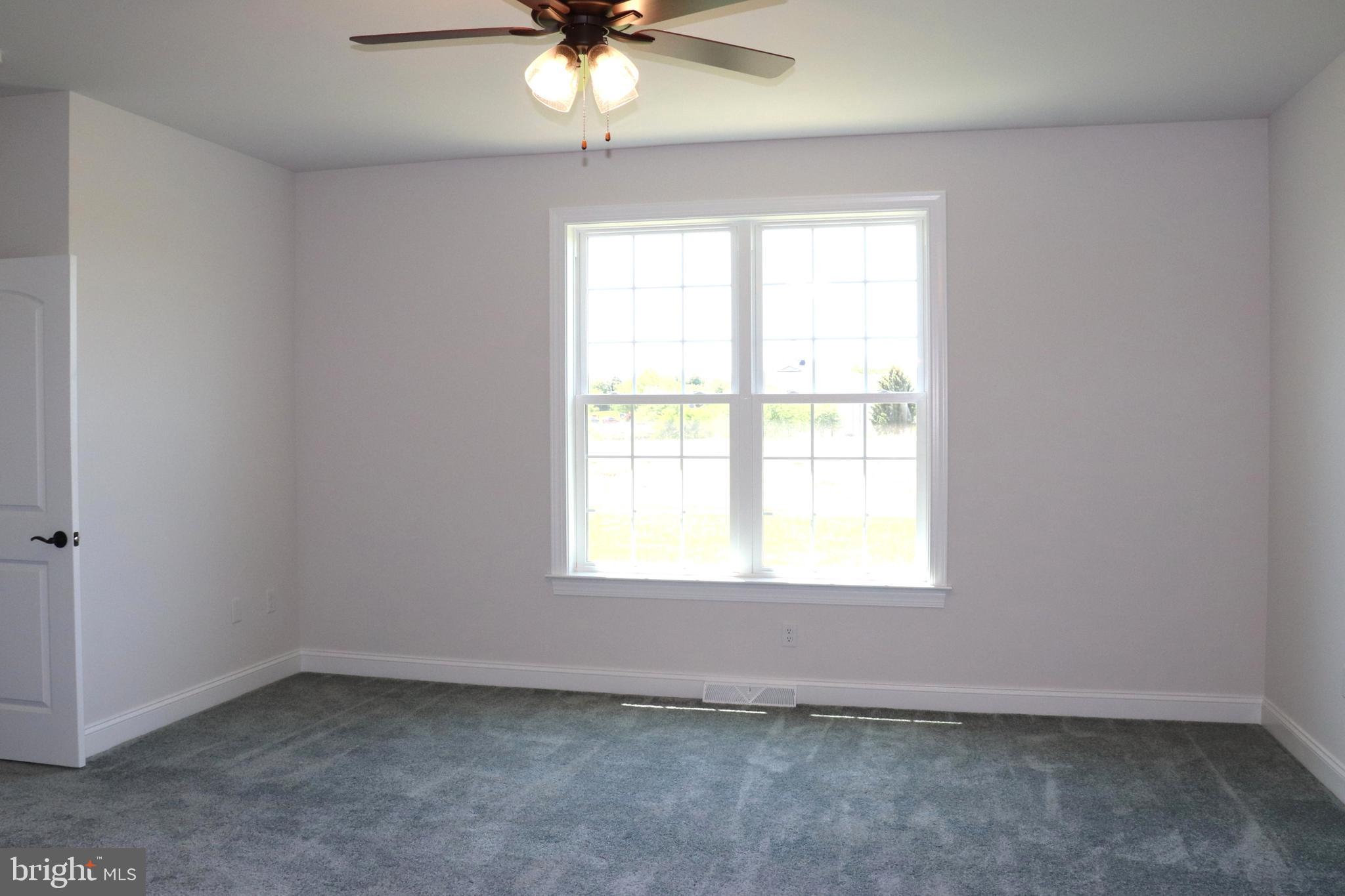 1029 Strafford Place, Unit 55 Lancaster, PA 17601 - Photo 19 of 40 an empty room with a window