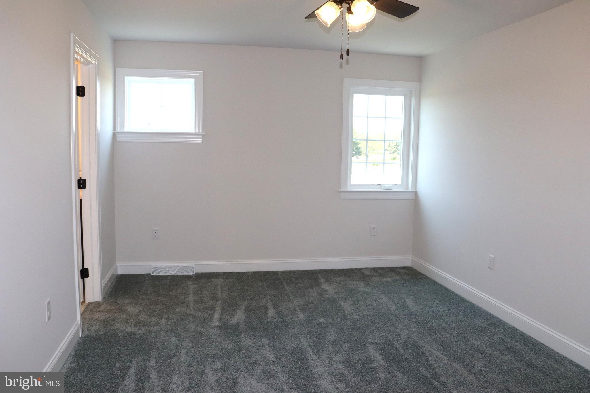 1029 Strafford Place, Unit 55 Lancaster, PA 17601 - Photo 29 of 40 an empty room with a window