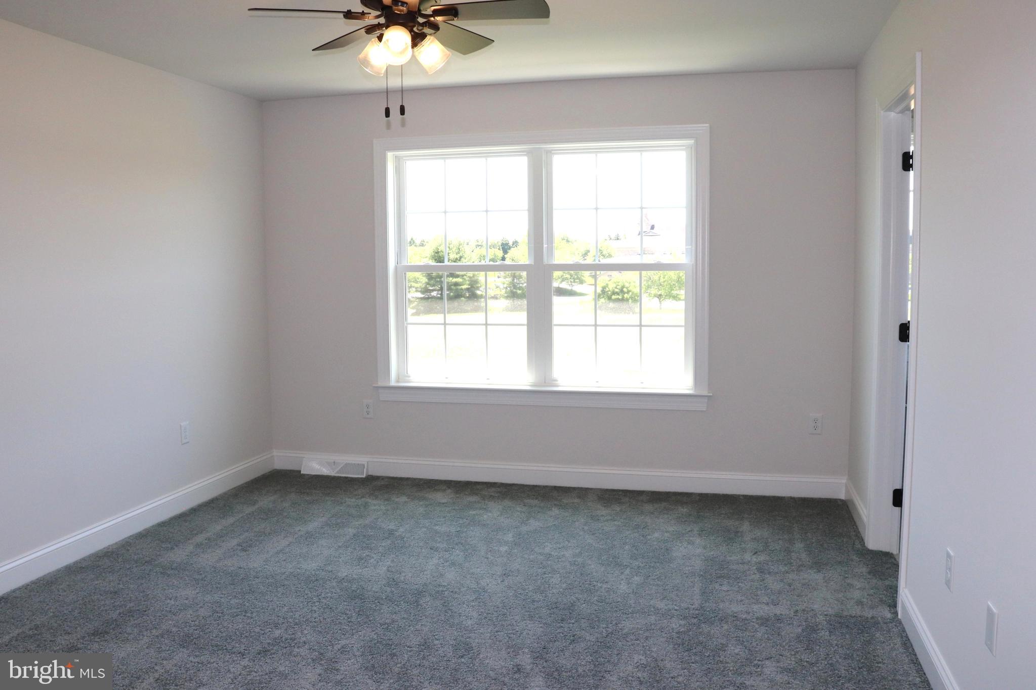 1029 Strafford Place, Unit 55 Lancaster, PA 17601 - Photo 32 of 40 an empty room with a window