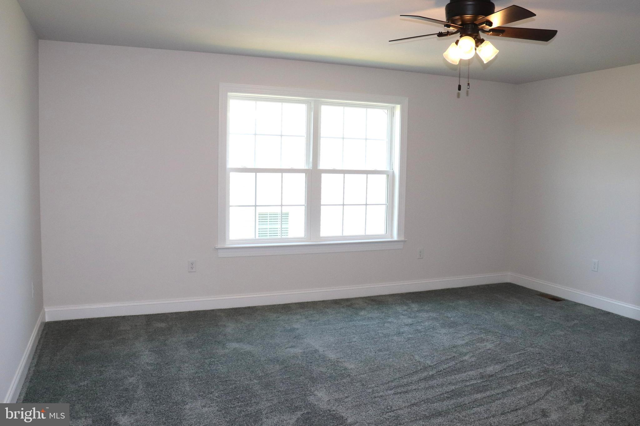 1029 Strafford Place, Unit 55 Lancaster, PA 17601 - Photo 35 of 40 an empty room with a window