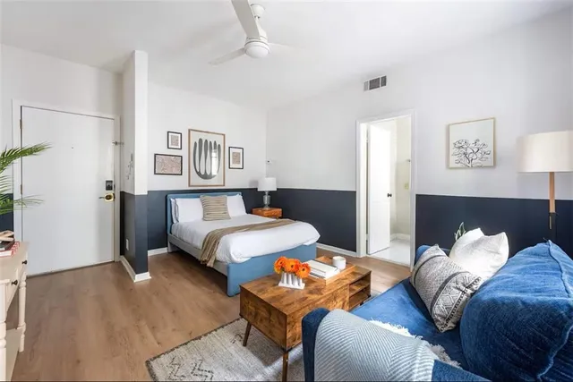 a living room with furniture fireplace and lamp