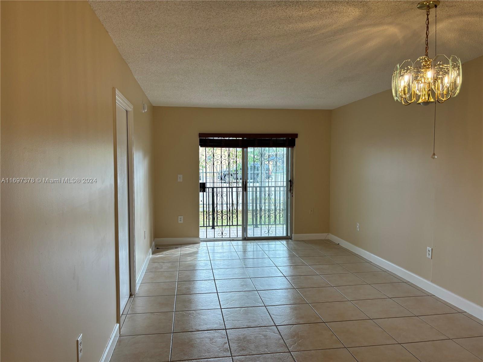 3181 Southwest 13th Street, Unit 111 Miami, FL 33145 - Photo 8 of 25 Living/Dinning Room combo from the front door.