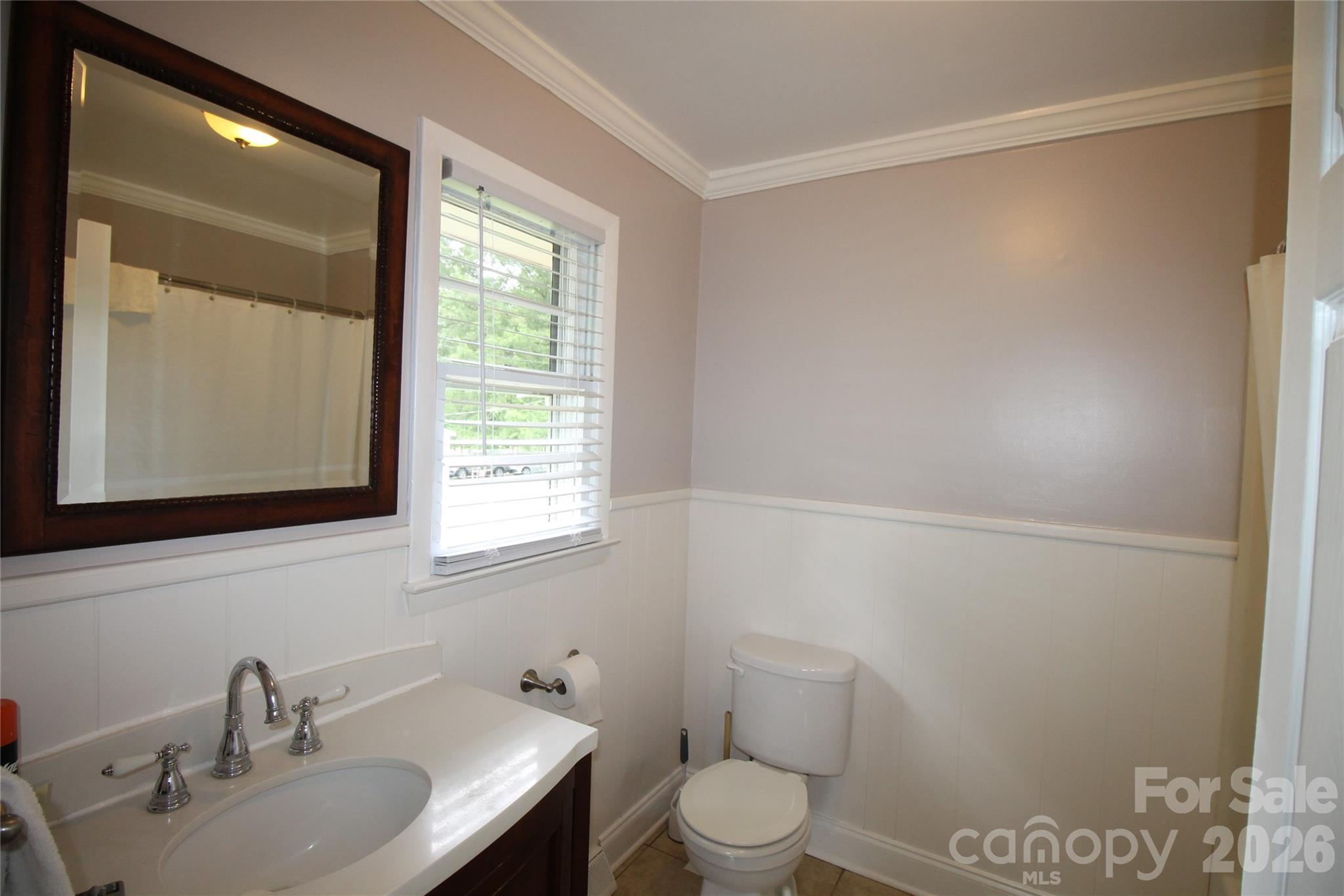 203 Ratchford Farm Road Gastonia, NC 28056 - Photo 25 of 38 a bathroom with a sink toilet and mirror