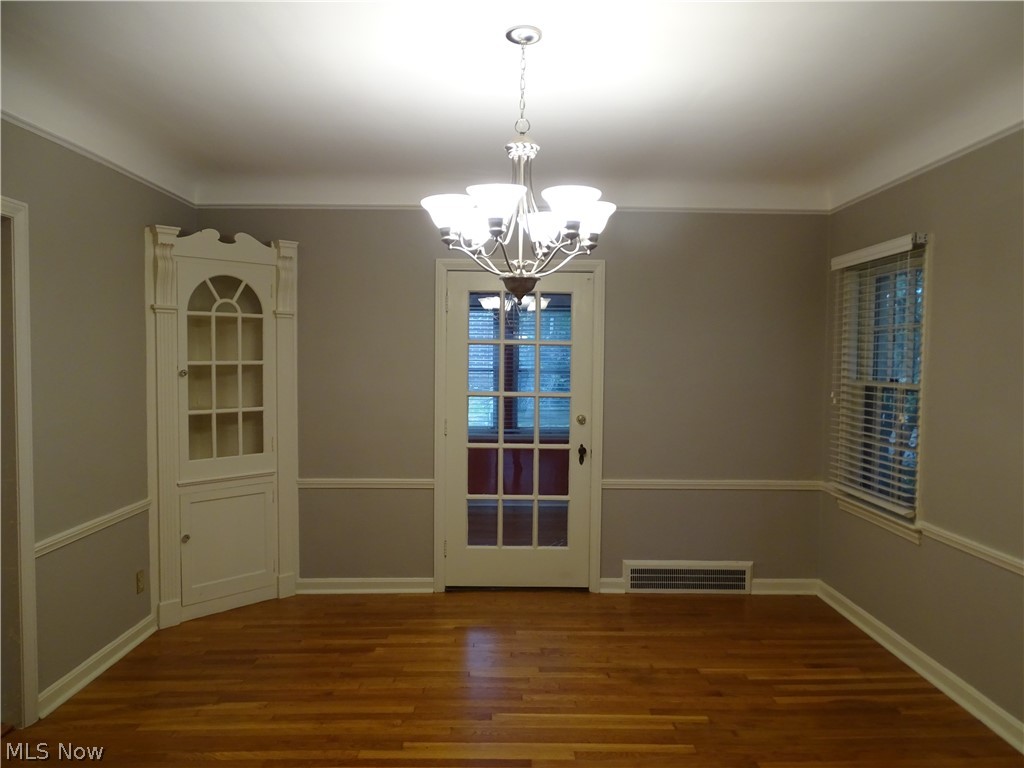 2563 Dysart Road Cleveland, OH 44118 - Photo 6 of 18 Formal dining room with built-in and access to 3-season room