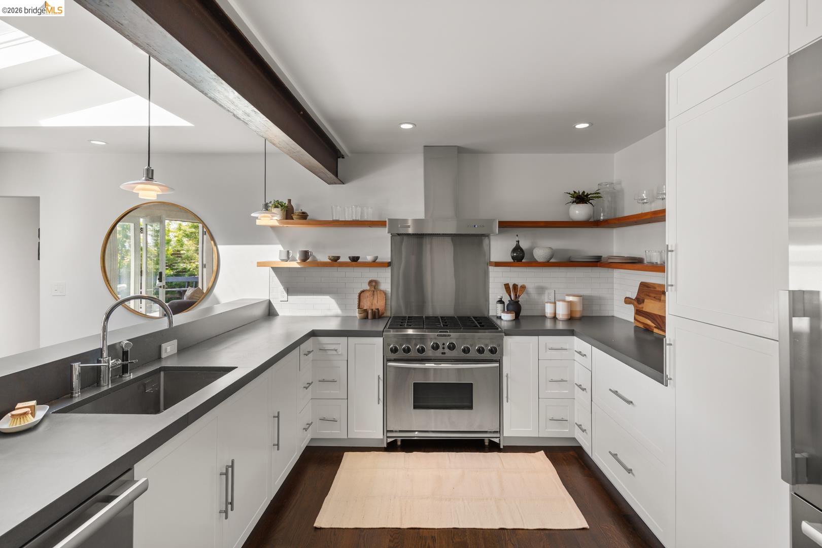 1119 Miller Avenue Berkeley, CA 94708 - Photo 13 of 33 a kitchen with a sink stove top oven and cabinets