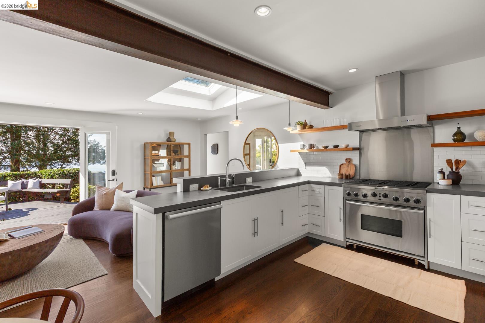 1119 Miller Avenue Berkeley, CA 94708 - Photo 14 of 33 a kitchen with stainless steel appliances granite countertop a stove and a sink