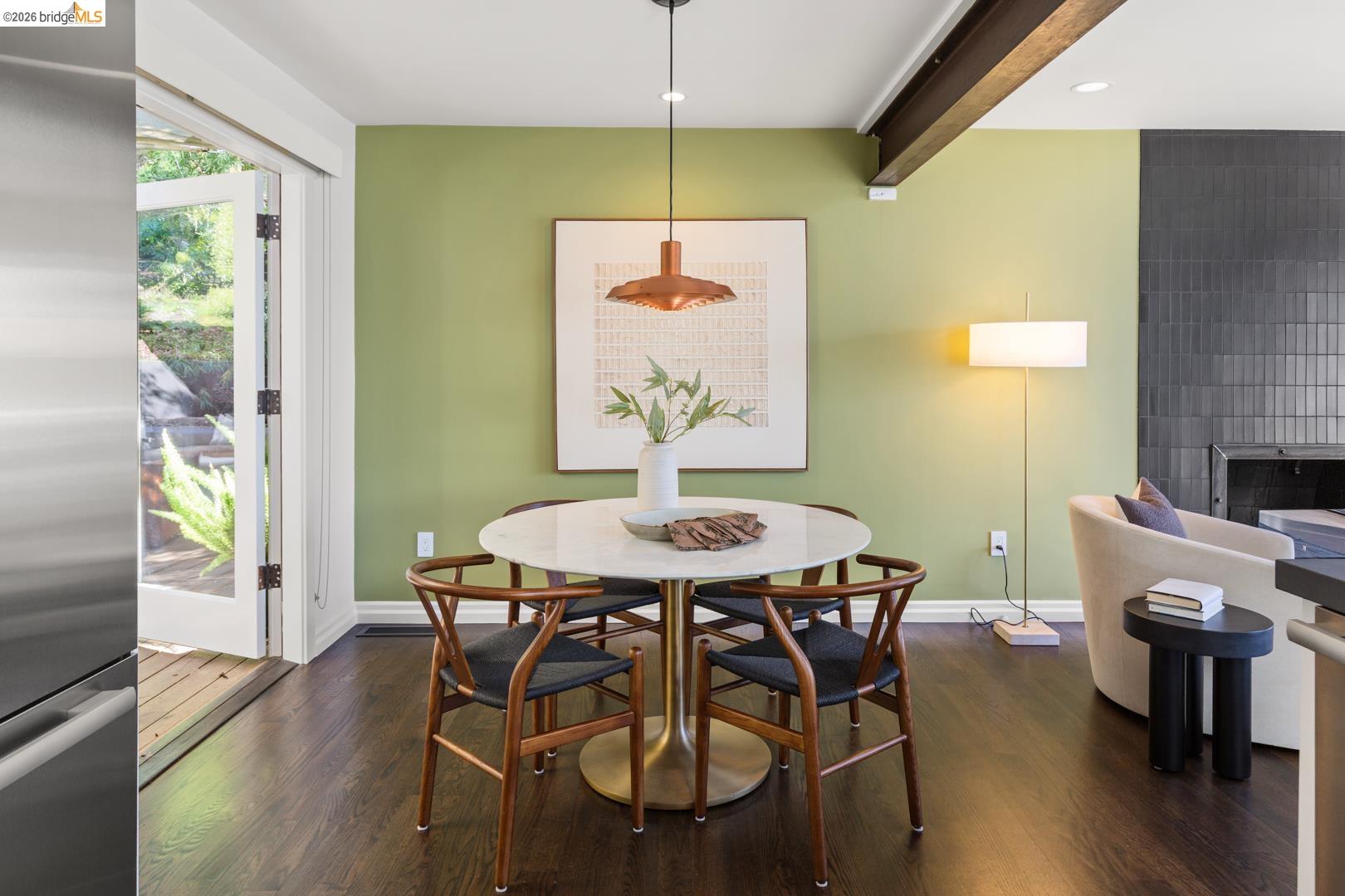1119 Miller Avenue Berkeley, CA 94708 - Photo 16 of 33 a view of a dining room with furniture window and wooden floor