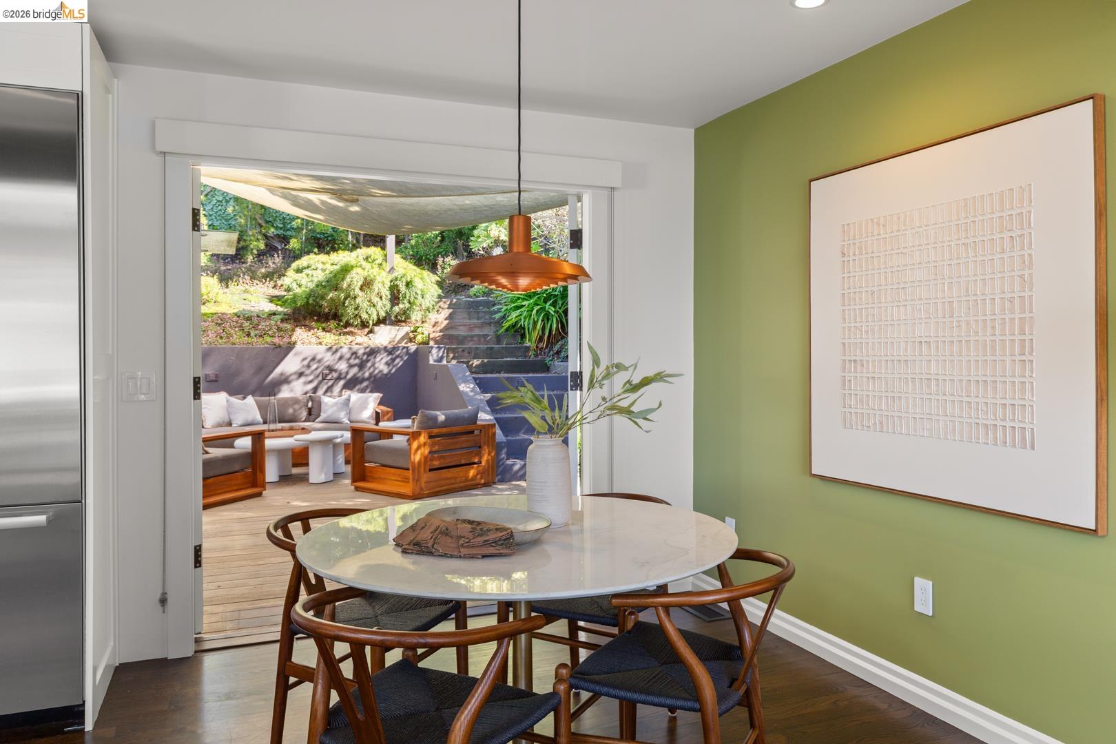 1119 Miller Avenue Berkeley, CA 94708 - Photo 17 of 33 a view of a dining room with furniture window and outside view