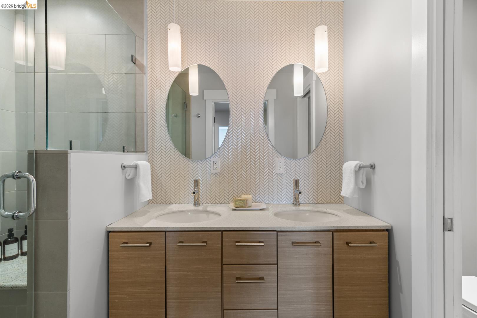 1119 Miller Avenue Berkeley, CA 94708 - Photo 21 of 33 a bathroom with a double vanity sink and a mirror