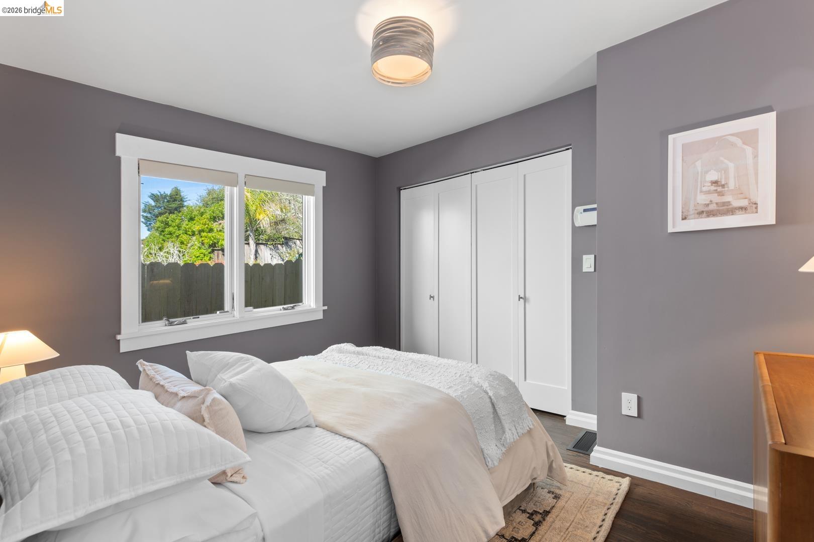 1119 Miller Avenue Berkeley, CA 94708 - Photo 22 of 33 a bedroom with two beds and a window