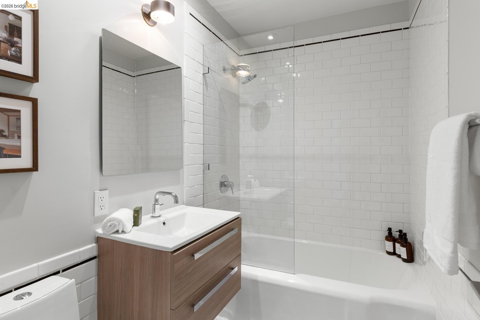 1119 Miller Avenue Berkeley, CA 94708 - Photo 23 of 33 a bathroom with a sink and a mirror