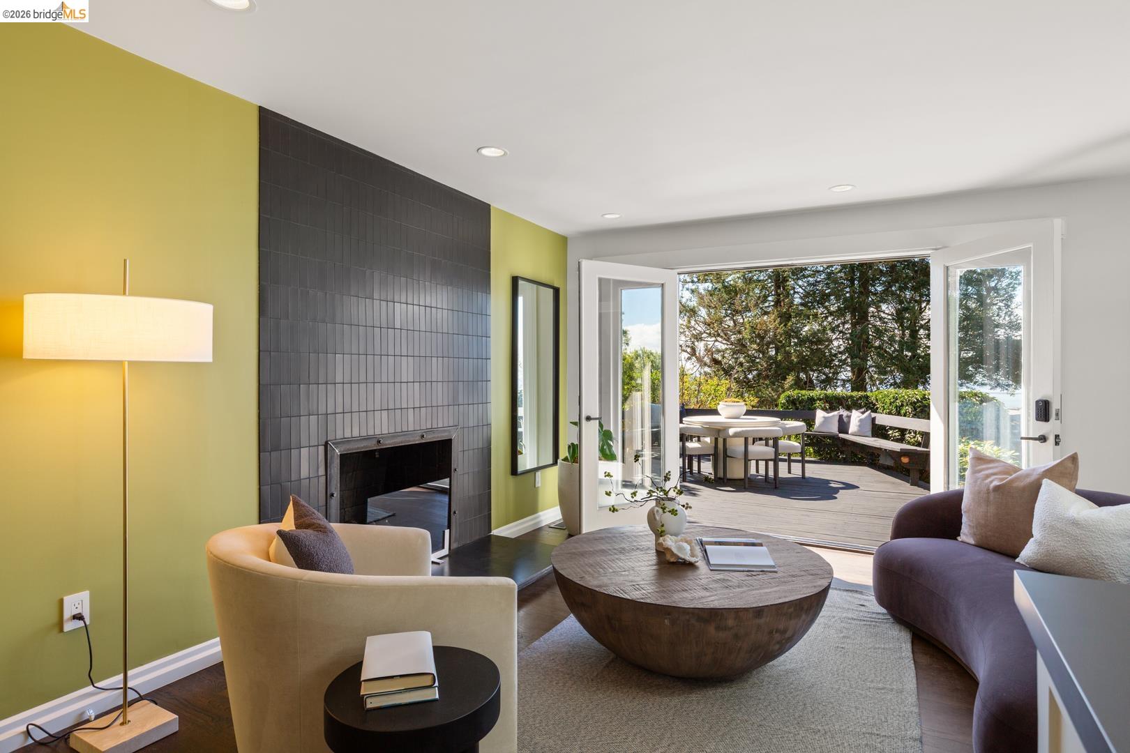 1119 Miller Avenue Berkeley, CA 94708 - Photo 8 of 33 a living room with furniture and a fireplace