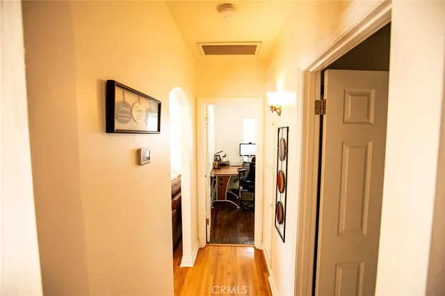 a view of a living room with a hallway