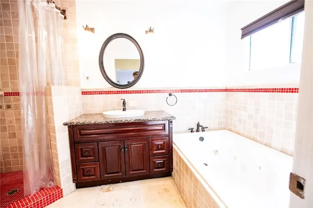 a bathroom with a sink and a bathtub