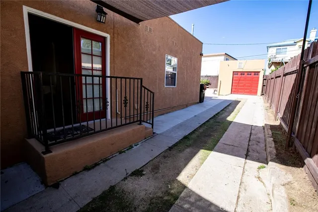 a view of balcony with furniture