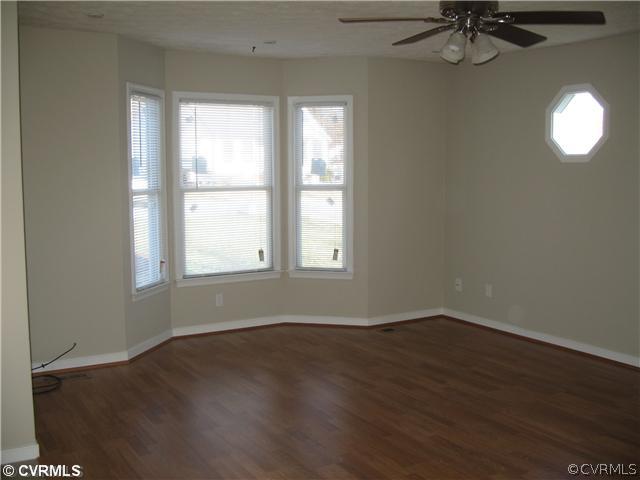 6313 Oldbern Road Chesterfield, VA 23832 - Photo 3 of 12 a view of a room with wooden floor and windows