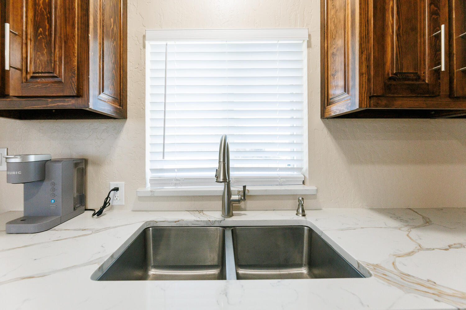 3807 East 3rd Street Lubbock, TX 79403 - Photo 13 of 35 a kitchen with a sink and a window