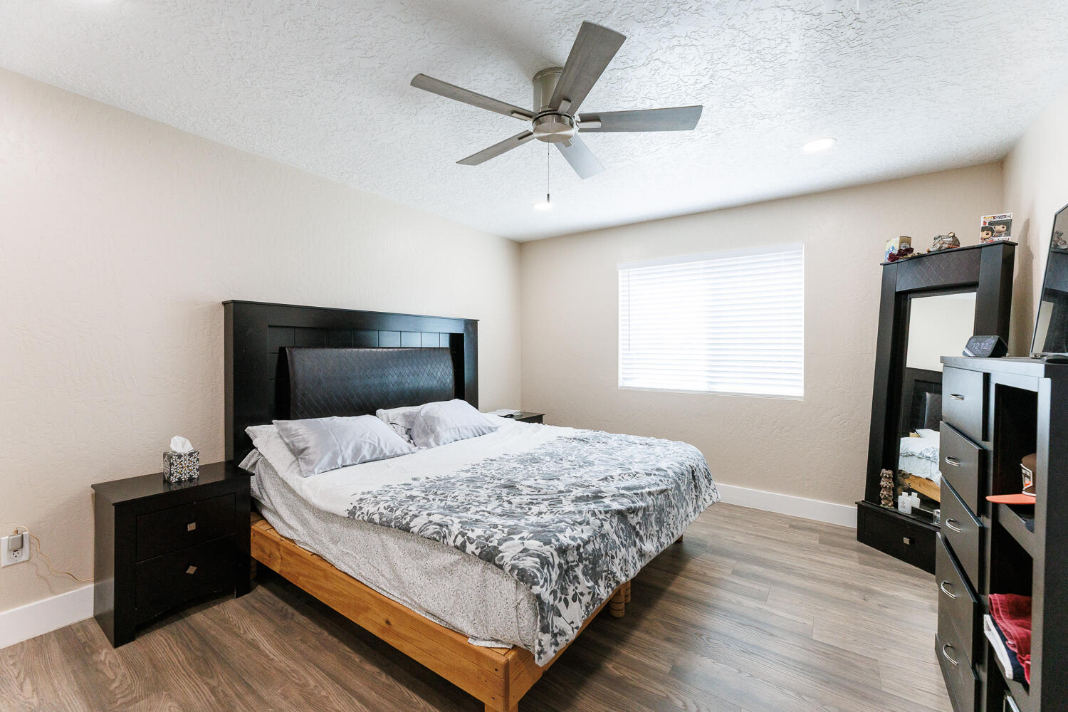 3807 East 3rd Street Lubbock, TX 79403 - Photo 20 of 35 a bedroom with a bed and a tv in it