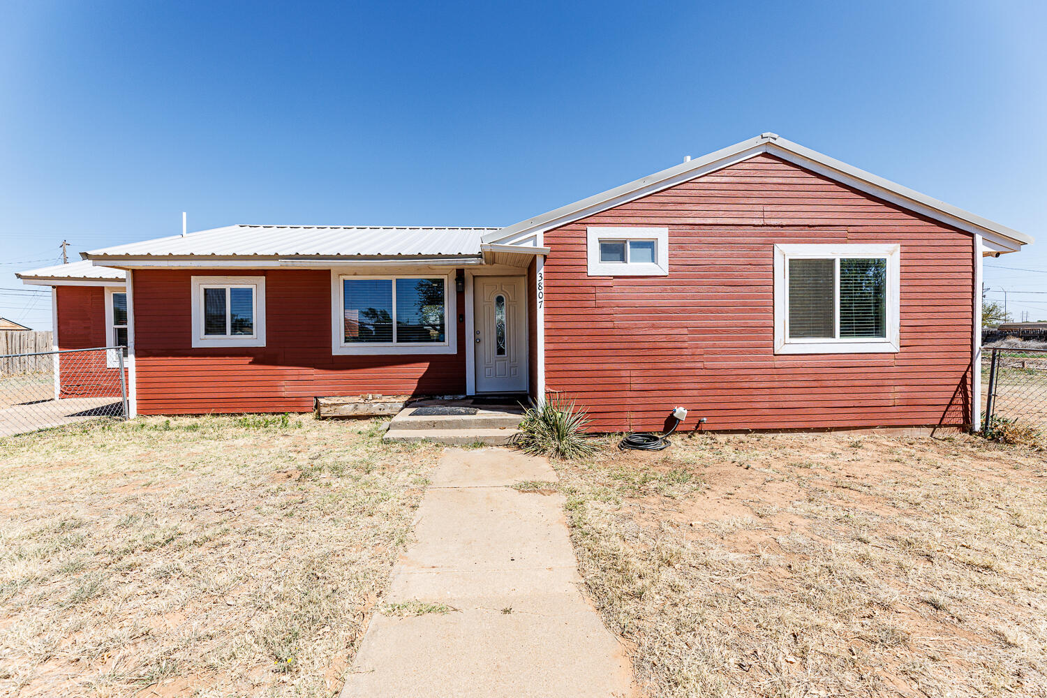 3807 East 3rd Street Lubbock, TX 79403 - Photo 2 of 35 a backyard of a house