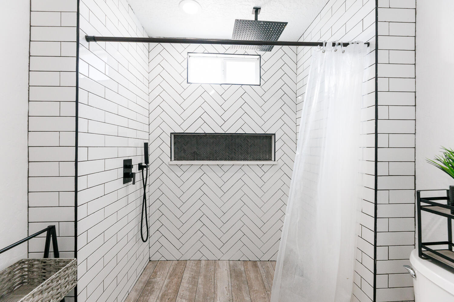 3807 East 3rd Street Lubbock, TX 79403 - Photo 25 of 35 a bathroom with a shower and a sink