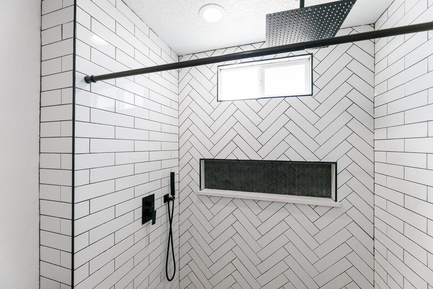 3807 East 3rd Street Lubbock, TX 79403 - Photo 26 of 35 a bathroom with a sink and a mirror