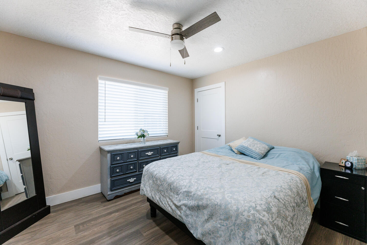 3807 East 3rd Street Lubbock, TX 79403 - Photo 27 of 35 a bedroom with a bed and a window