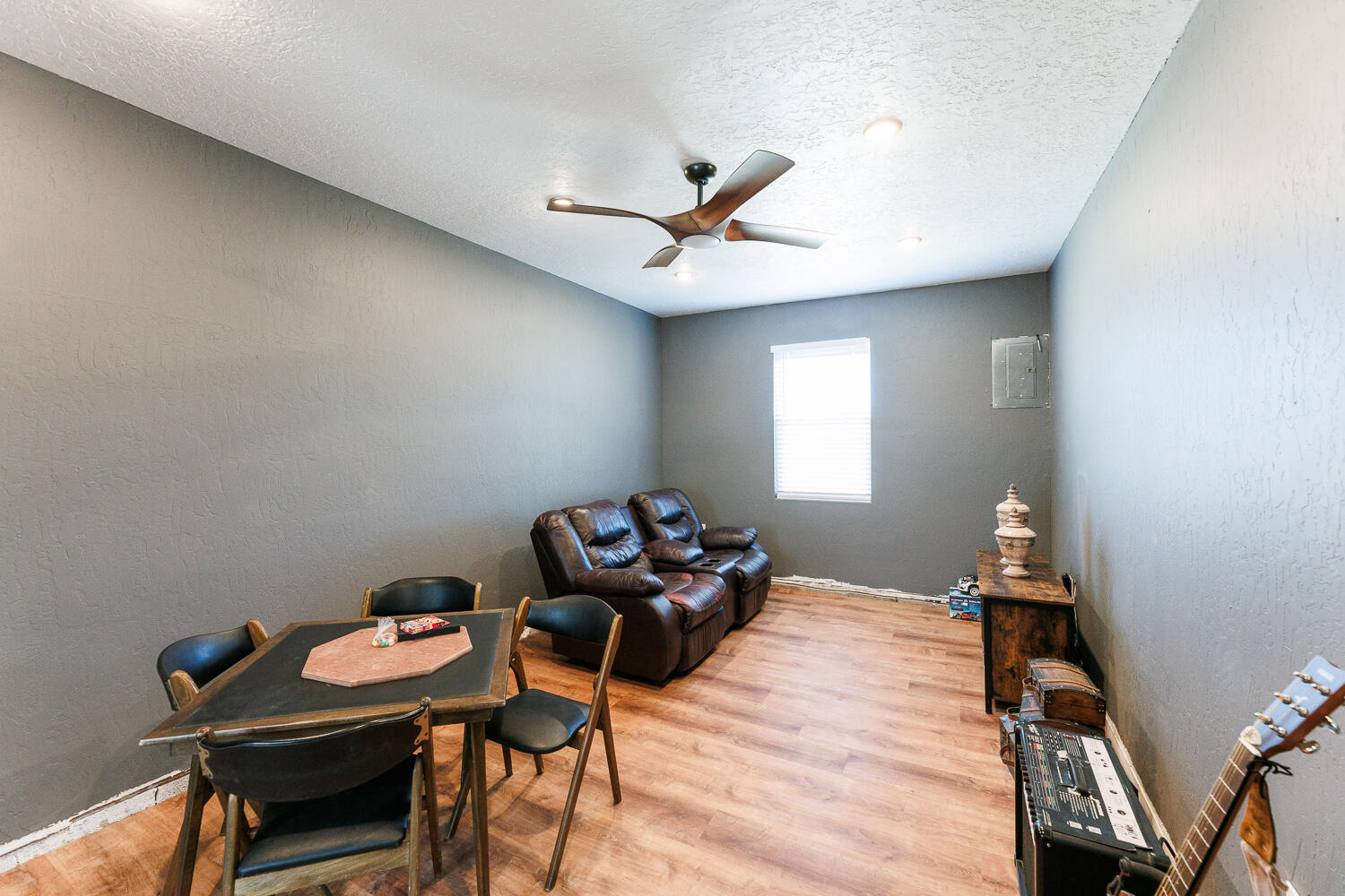 3807 East 3rd Street Lubbock, TX 79403 - Photo 30 of 35 a bedroom with furniture and a window