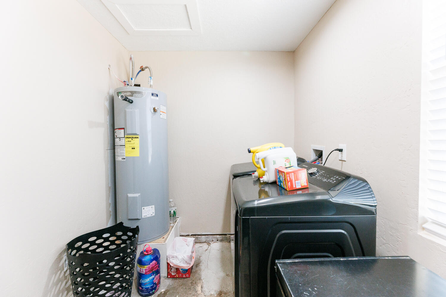 3807 East 3rd Street Lubbock, TX 79403 - Photo 32 of 35 a utility room with dryer and washer