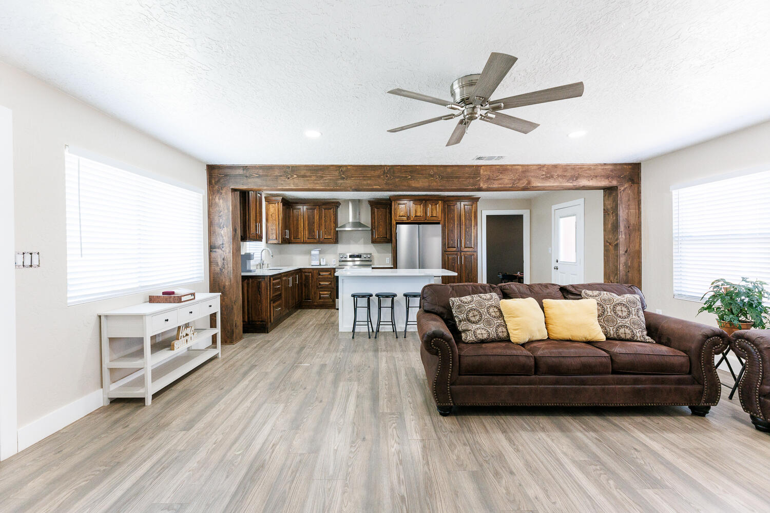 3807 East 3rd Street Lubbock, TX 79403 - Photo 9 of 35 a living room with furniture and a wooden floor