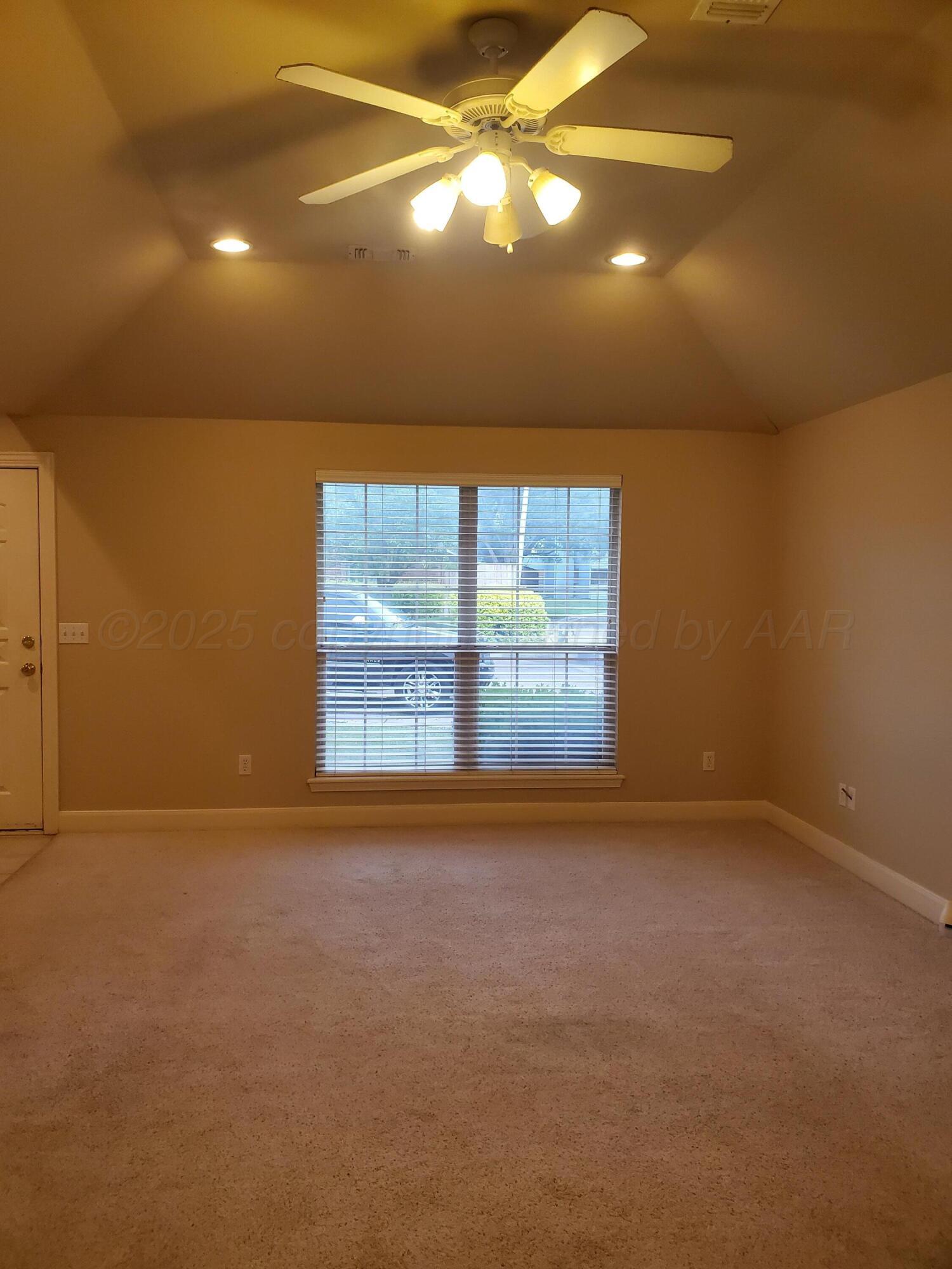 1 Windtree Amarillo, TX 79109 - Photo 5 of 18 a view of an empty room with a window