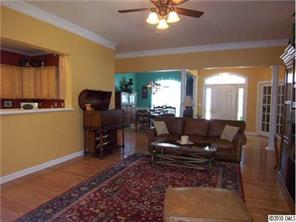944 Knightsbridge Road Fort Mill, SC 29708 - Photo 2 of 16 a living room with furniture and a chandelier