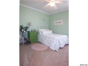 944 Knightsbridge Road Fort Mill, SC 29708 - Photo 12 of 16 a living room with a couch and a potted plant