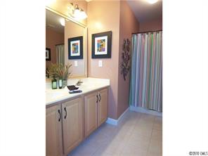 944 Knightsbridge Road Fort Mill, SC 29708 - Photo 14 of 16 a bathroom with a double vanity sink and mirror