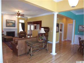 944 Knightsbridge Road Fort Mill, SC 29708 - Photo 4 of 16 a living room with furniture and a chandelier