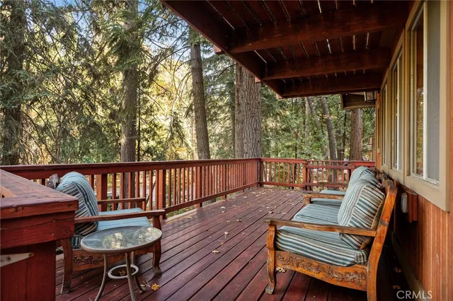 a view of a two chairs in the deck