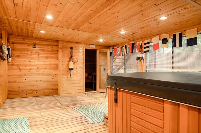a kitchen with stainless steel appliances granite countertop a stove and cabinets
