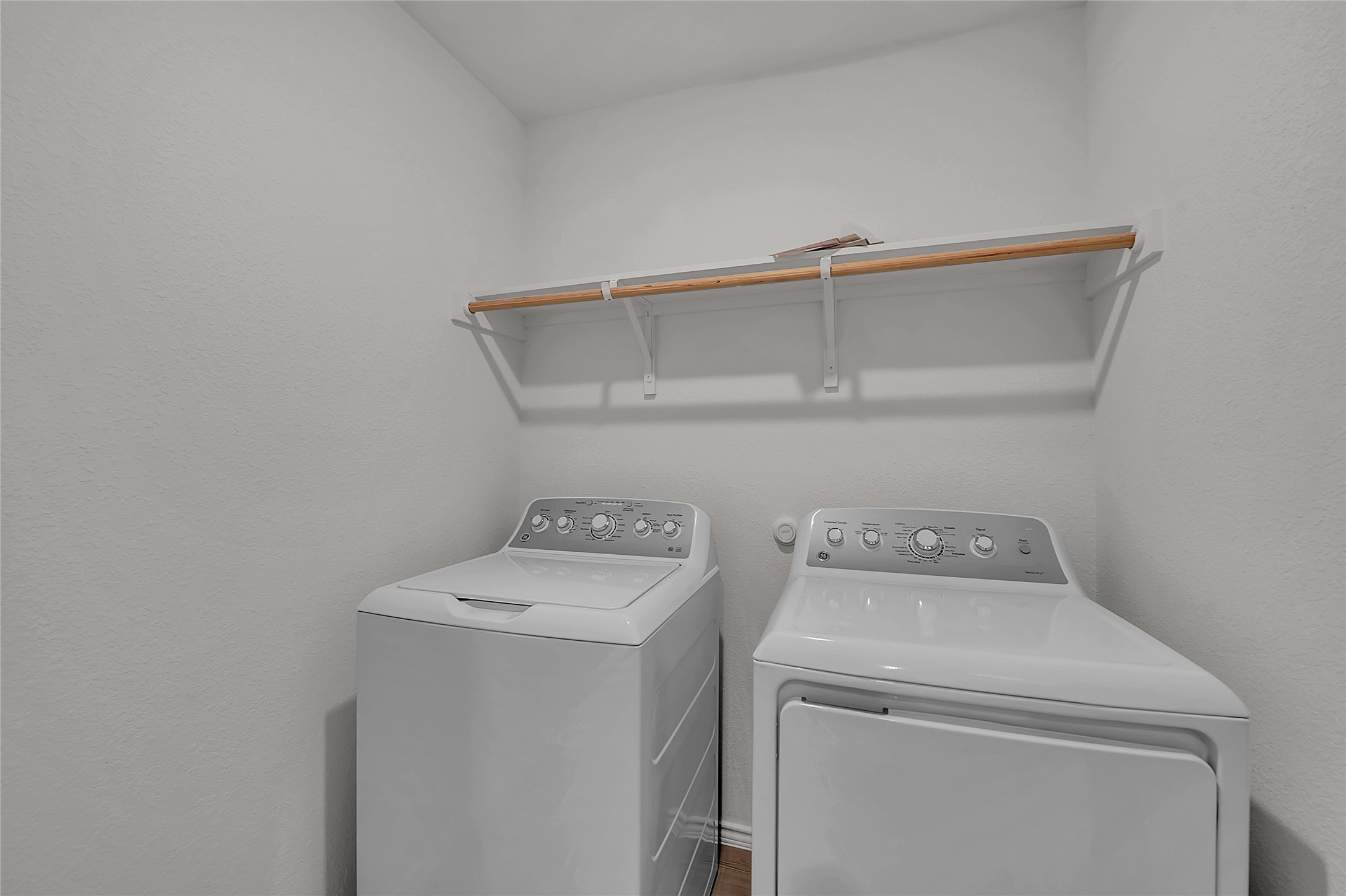 2528 Willkomen Way Manor, TX 78653 - Photo 16 of 21 a utility room with dryer and washer